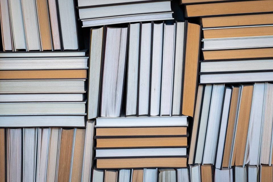 A neat stack of books