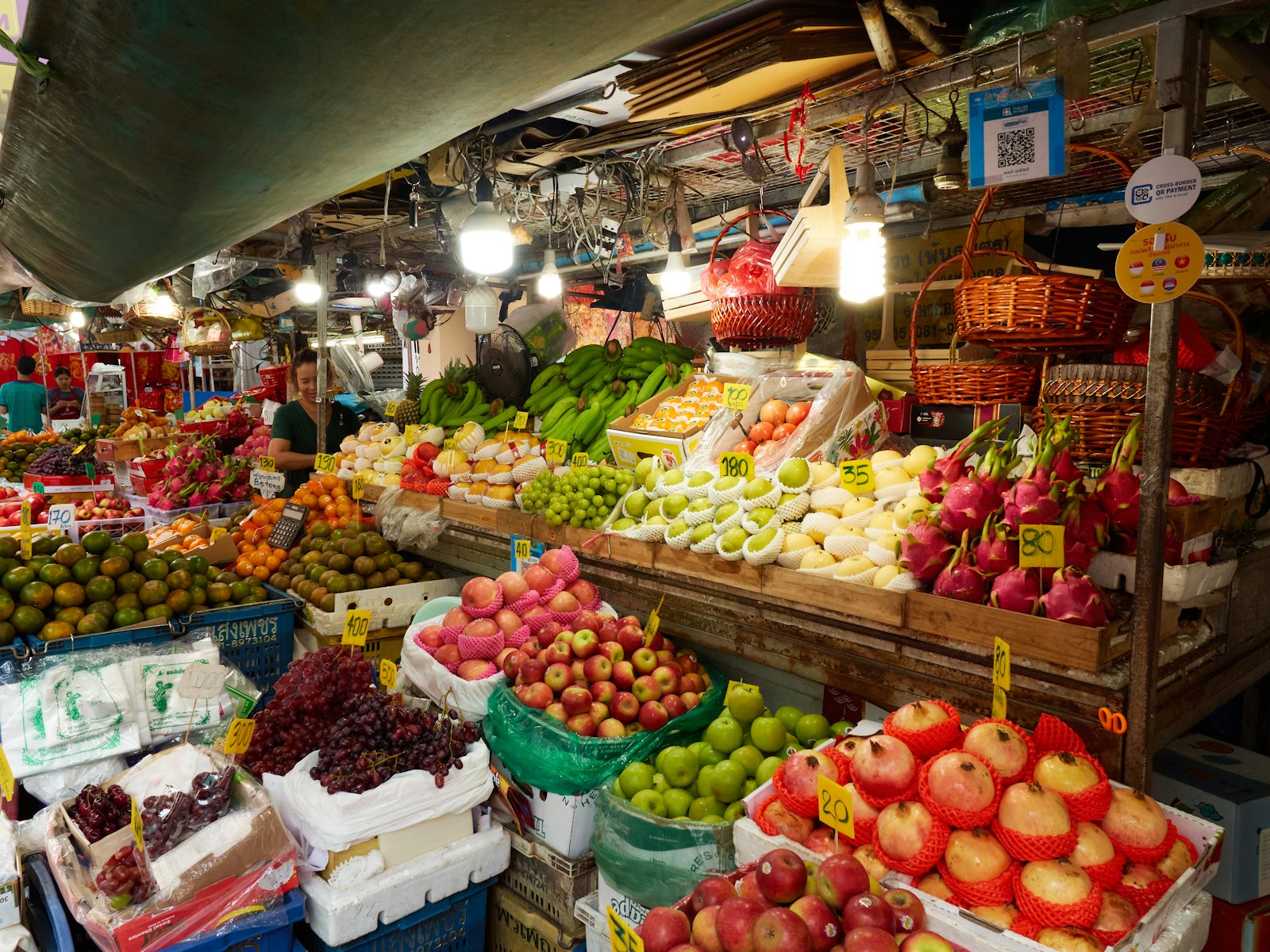 Market stall piled high with fruit and vegetables